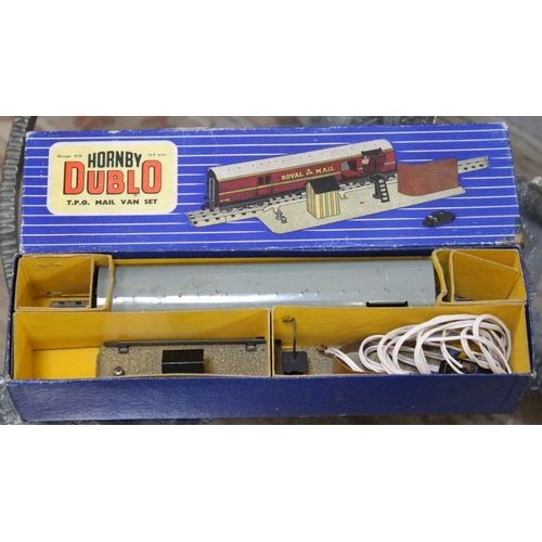 243 - A large collection of mainly boxed Hornby Dublo Trains and accessories. including the TPO mail box s... 