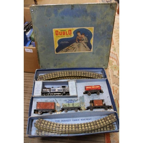 243 - A large collection of mainly boxed Hornby Dublo Trains and accessories. including the TPO mail box s... 