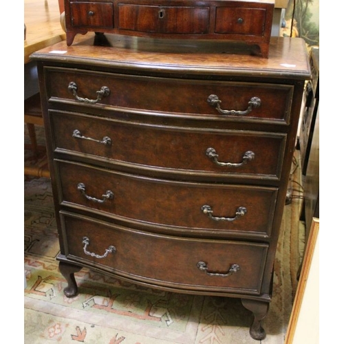 249 - A reproduction burr walnut Serpentine fronted veneered chest of four graduating drawers, on short ca... 