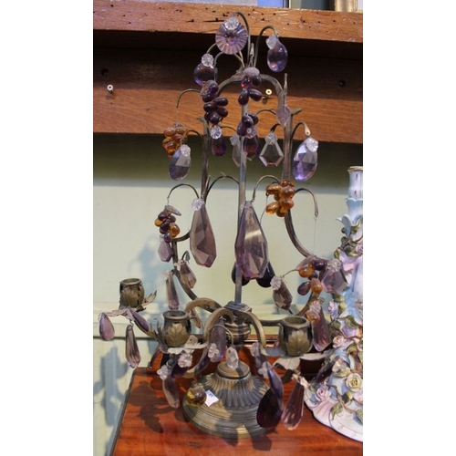 263 - A pair of brass candle stands, hung with amber & lavender glass lustres, 50cm high