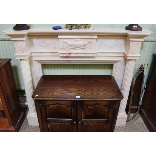 292 - A late 20th century Adams design marble effect fire surround and mantle, 124cm x 150cm