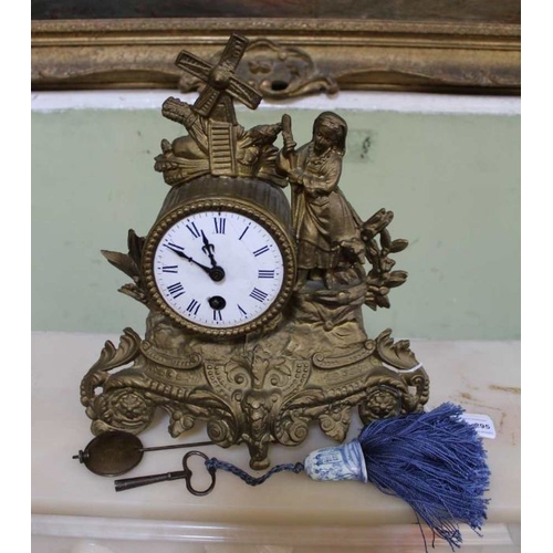 295 - A French clock of Dutch design with pendulum and key, 27cm high