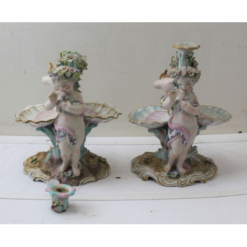 45 - A pair of 19th century Continental porcelain candlesticks