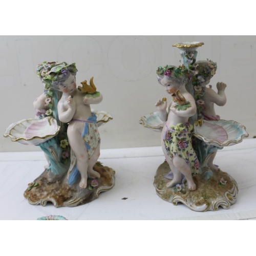 45 - A pair of 19th century Continental porcelain candlesticks