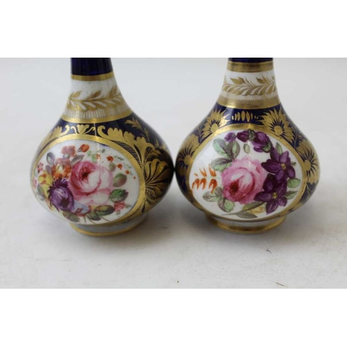 48 - A pair of Royal Crown Derby vases, floral painted and one other similar