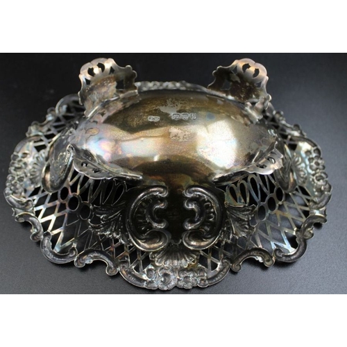 5 - Sibray Hall and Co, a silver sweetmeat bowl, pierced and embossed decoration, London 1893, 18.5cm x ... 