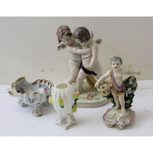 53 - A scallop form salt, Chelsea type putti, cactus vase and Capo wrestling putti