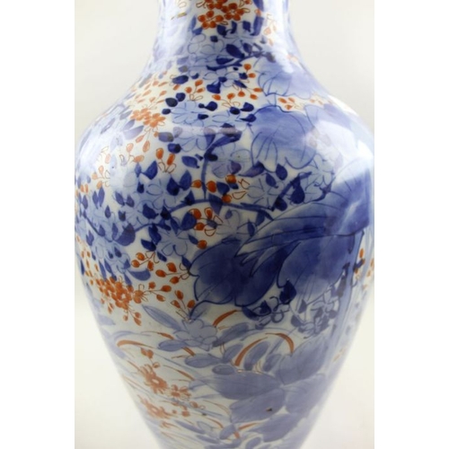 60 - A Japanese Imari vase, painted cobalt blue bird and peony decoration, iron red highlights, 47cm high