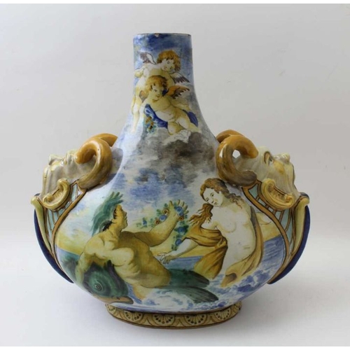 67 - A Continental majolica vase, of tear drop form, having satyr masks to the shoulders, painted with sc... 