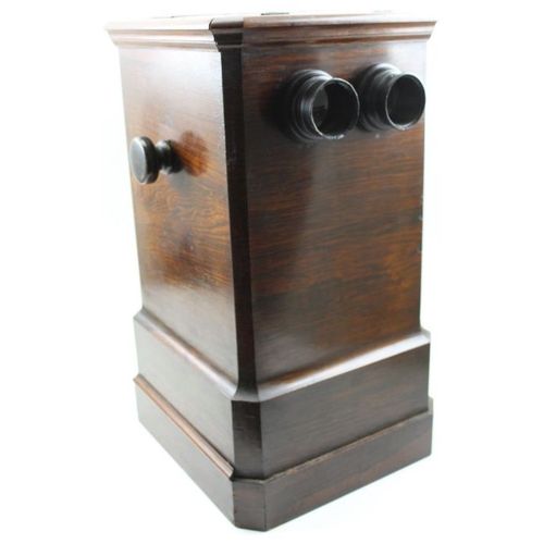 68 - A rosewood cased table top stereoscopic viewer, c.1900, 46cm high, with 50 glass slides