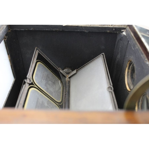 68 - A rosewood cased table top stereoscopic viewer, c.1900, 46cm high, with 50 glass slides