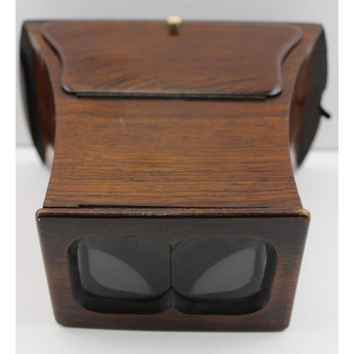 69 - An Edwardian rosewood stereoscopic viewer, 20cm x 16cm, with slides