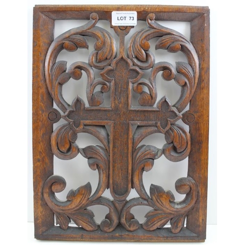 73 - A  Continental carved oak panel, pierced decoration, depicts acanthus scrolls about a cross, 37cm x ... 