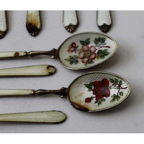 8 - Adie Brothers Ltd, a set of six silver and enamel coffee spoons, London 1962, together with four oth... 