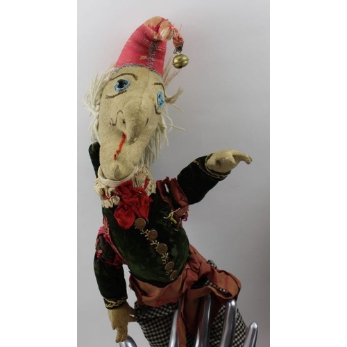 88 - A pair of 19th century Punch & Judy dolls, chamois faces and hands, original costumes, both 47cm hig... 