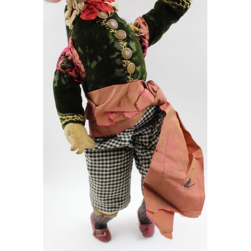 88 - A pair of 19th century Punch & Judy dolls, chamois faces and hands, original costumes, both 47cm hig... 