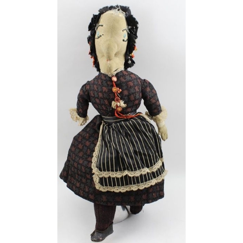 88 - A pair of 19th century Punch & Judy dolls, chamois faces and hands, original costumes, both 47cm hig... 