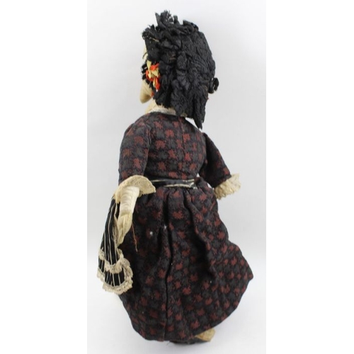 88 - A pair of 19th century Punch & Judy dolls, chamois faces and hands, original costumes, both 47cm hig... 