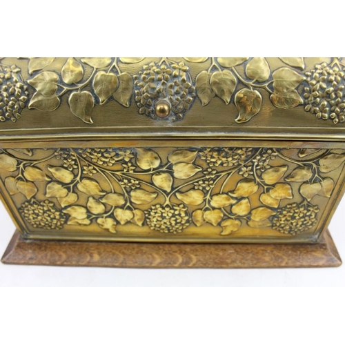 91 - An early 20th century, Art Nouveau, oak desk top stationary casket, with decoratively embossed brass... 