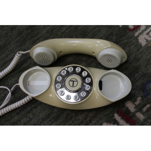 151 - Two vintage telephones.