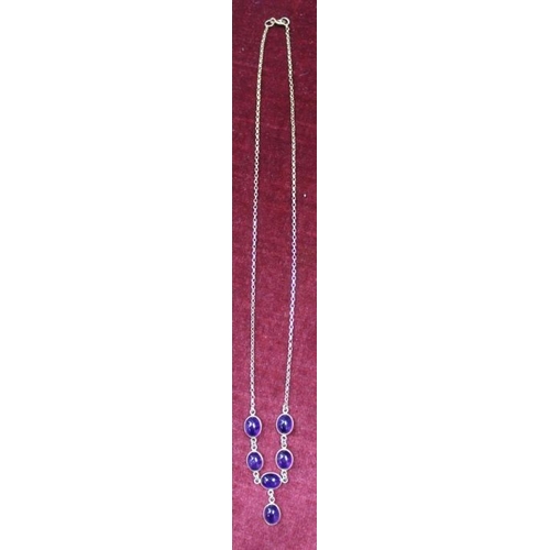 255 - A Gold and Amethyst necklace.