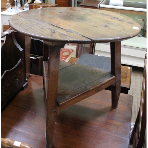 119 - A 19th century oak two-tier cricket table, 62cm in diameter x 59cm high