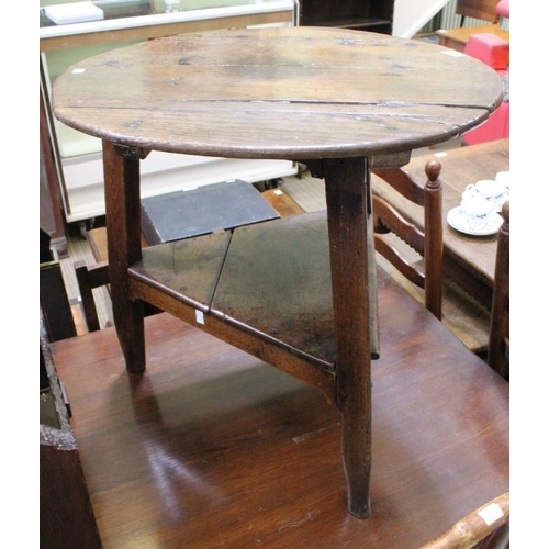 119 - A 19th century oak two-tier cricket table, 62cm in diameter x 59cm high