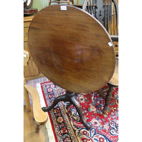 126 - An early 19th century mahogany tilt top tripod table on cannon barrel column with bird cage action, ... 