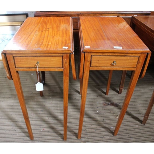 129 - A pair of early 19th century small sized satinwood Pembroke tables, each fitted with a single drawer... 