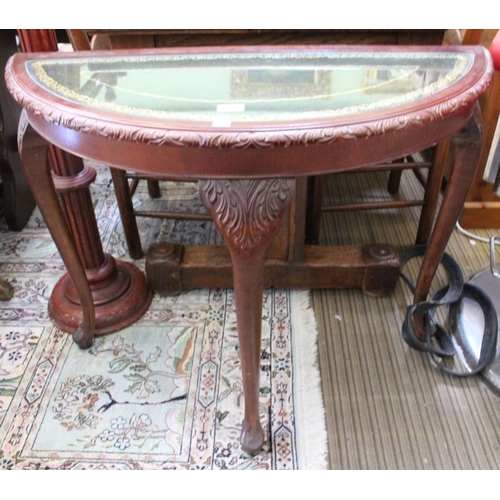 131 - A D-shape hall table, tooled green top, together with a column torchere