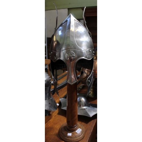 155 - A Helmet with steel wings and a nose piece