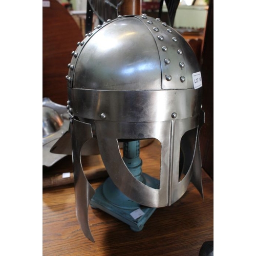 156 - A Helmet with a face guard & ear protectors