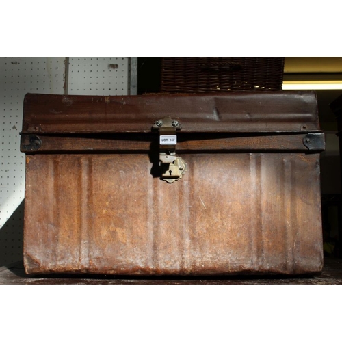 167 - A tin travel trunk with side handles & flat top