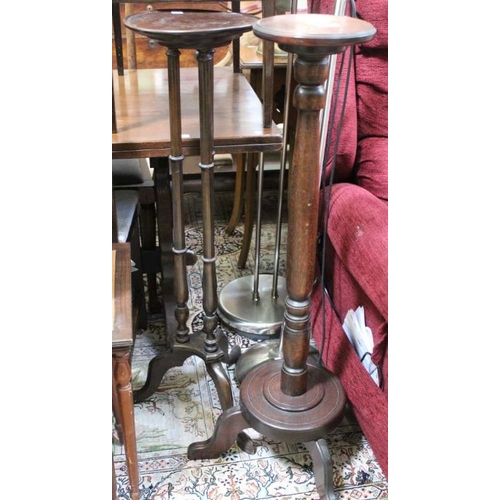 176 - Two circular topped plant stand, on three downswept legs, 100cm high