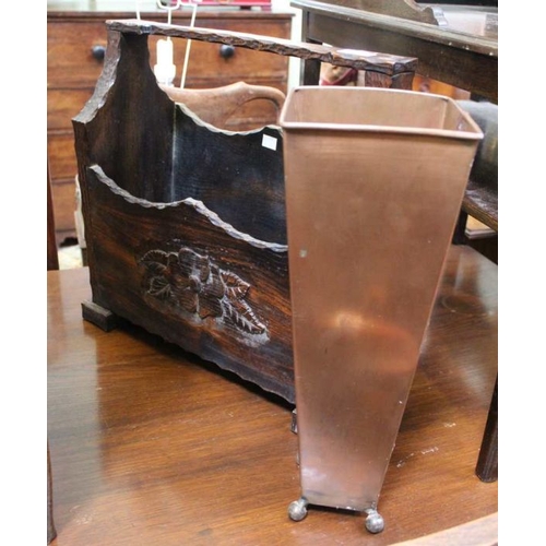 185 - An oak carved magazine rack together with a copper vase