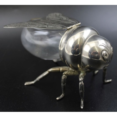 2 - A silver plate and glass bee form honey jar, having hinged wings forming the lid, stamped 