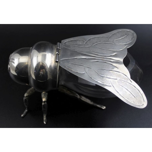 2 - A silver plate and glass bee form honey jar, having hinged wings forming the lid, stamped 