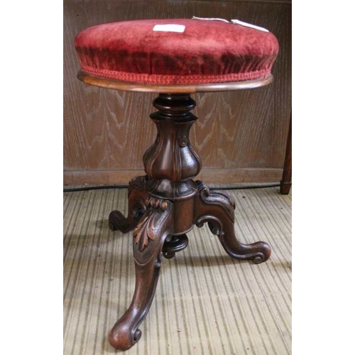 201 - A mid 19th century swivel piano stool