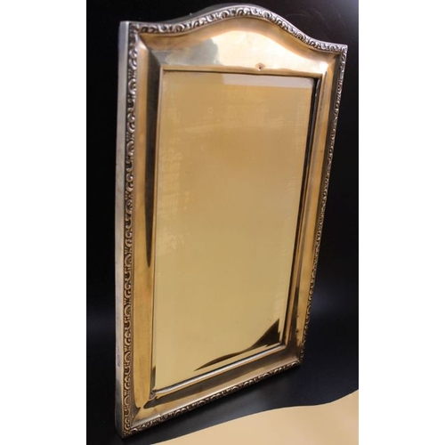 23 - An early 20th century silver framed table mirror, inset bevelled glass, the back with easel stand, C... 