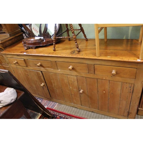 242 - A 19th century pine dresser base, fitted four drawers over two cupboards, 199cm wide x 52.5cm deep, ... 