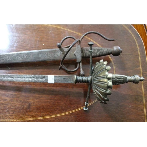 247 - A Rapier and an Antique sword.