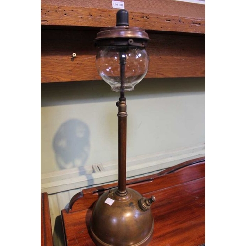 265 - A brass Tilley lamp with original glass shade