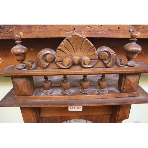 287 - An early 20th Century Mahogany Viennese style hanging wall clock with pendulum and key, 90cm