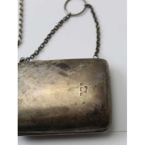 30 - A silver purse with chain handle, Birmingham 1904, blue fabric interior, together with a silver neck... 