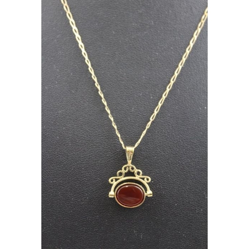 36 - A 9ct gold mounted fob pendant carnelian & stained onyx on chain