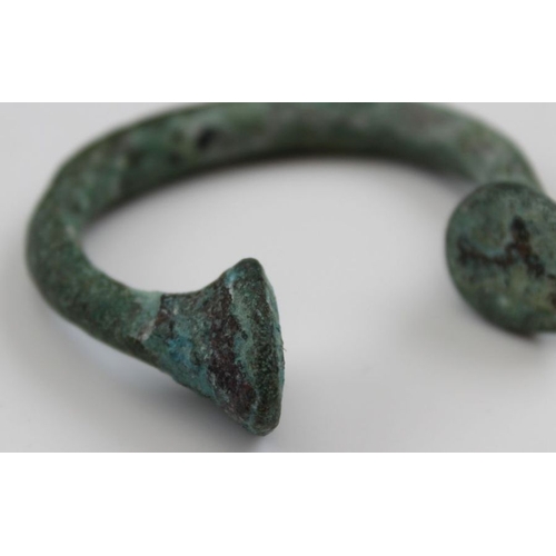 44 - An early bronze Torc bangle