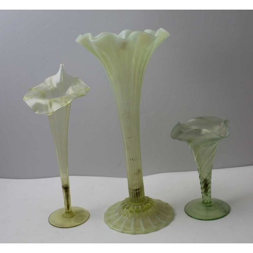 68 - Three Victorian opaline glass vases, one of 