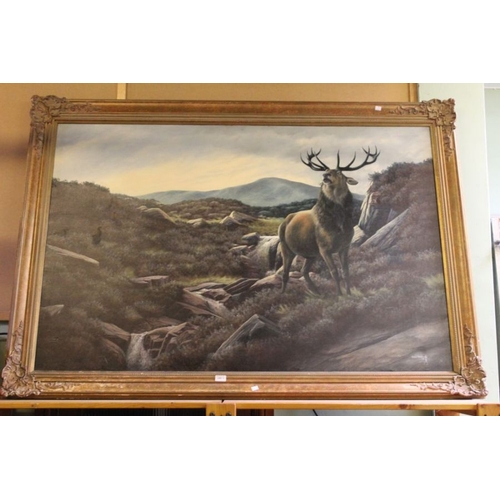 1 - Nigel Hemming - A large oil painting of a stag on the moor, gilt framed 100 x 152 cm