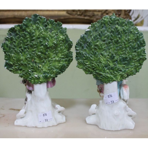 11 - A pair of porcelain Bocage musician groups, 18cm high