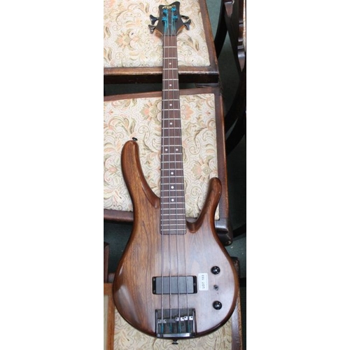 183 - A Fenix short scale bass guitar, the natural wooden body fitted with single pick up